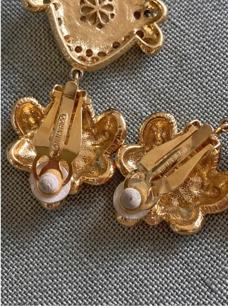 Boucles d'oreilles clips Nina Ricci, en laiton